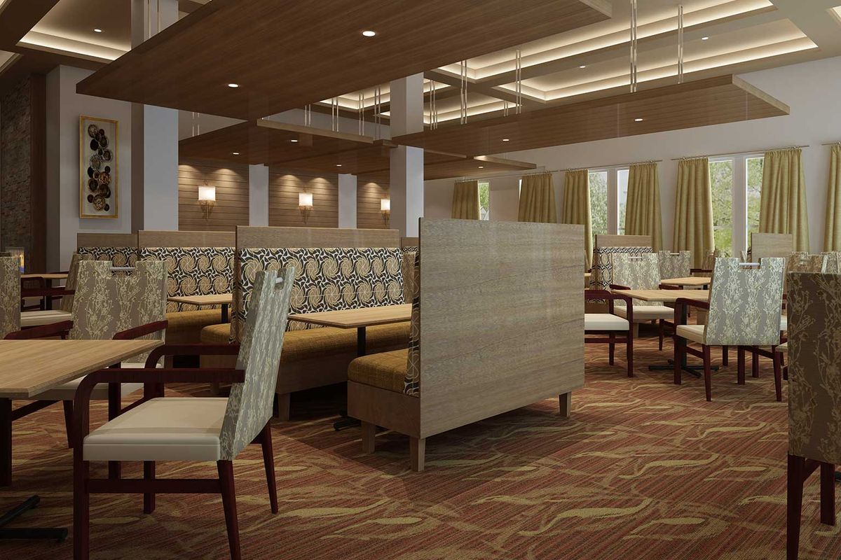 A modern restaurant interior featuring lined-up booths and chairs with ambient lighting.