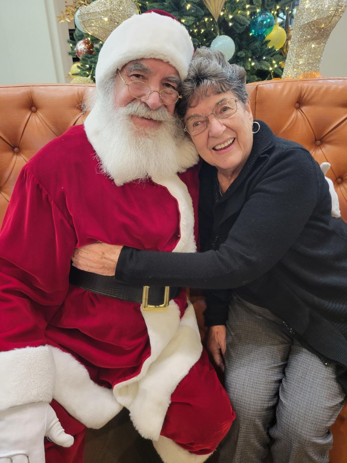 A joyful moment with Santa Claus during the holiday season.