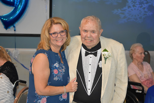 A joyful moment captured at a formal event.