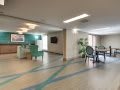A modern office lobby with comfortable seating and stylish decor.