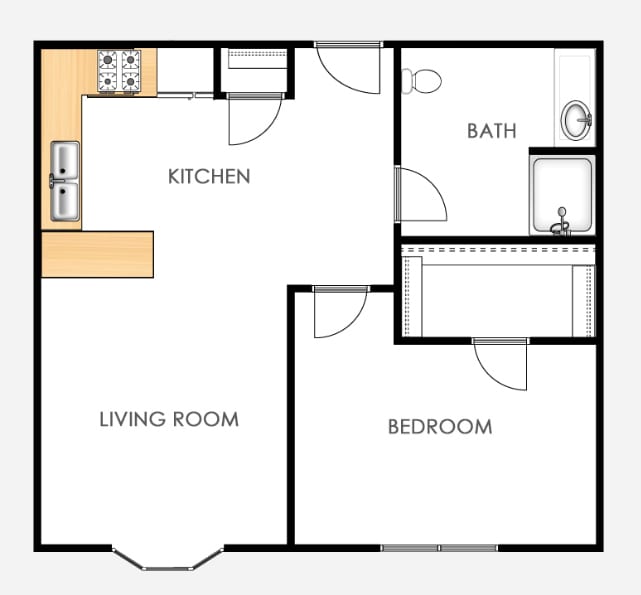 A floor plan of a one-bedroom apartment featuring a kitchen, living room, and bathroom.