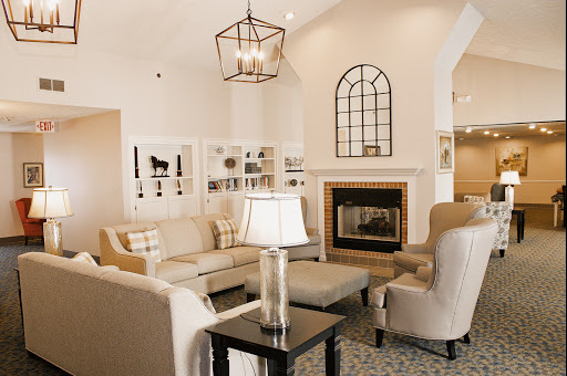 A beautifully designed living room featuring a cozy arrangement with a fireplace and stylish decor.