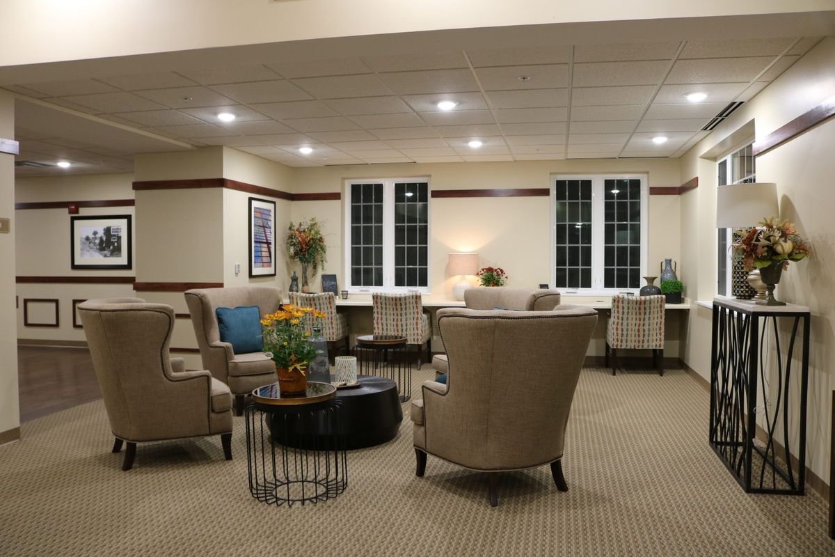 A cozy lounge area with comfortable seating and elegant decor.
