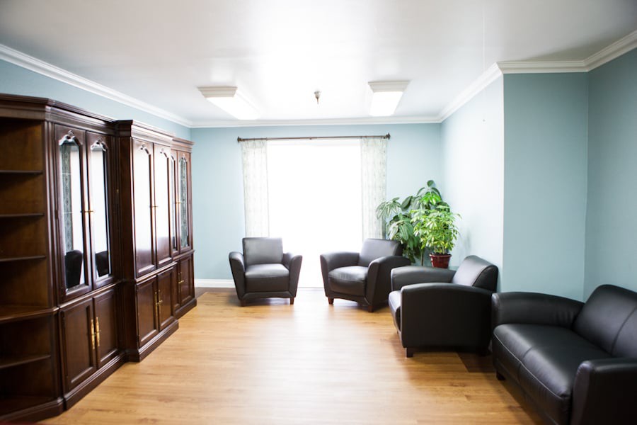 A modern living room with comfortable seating and natural light.