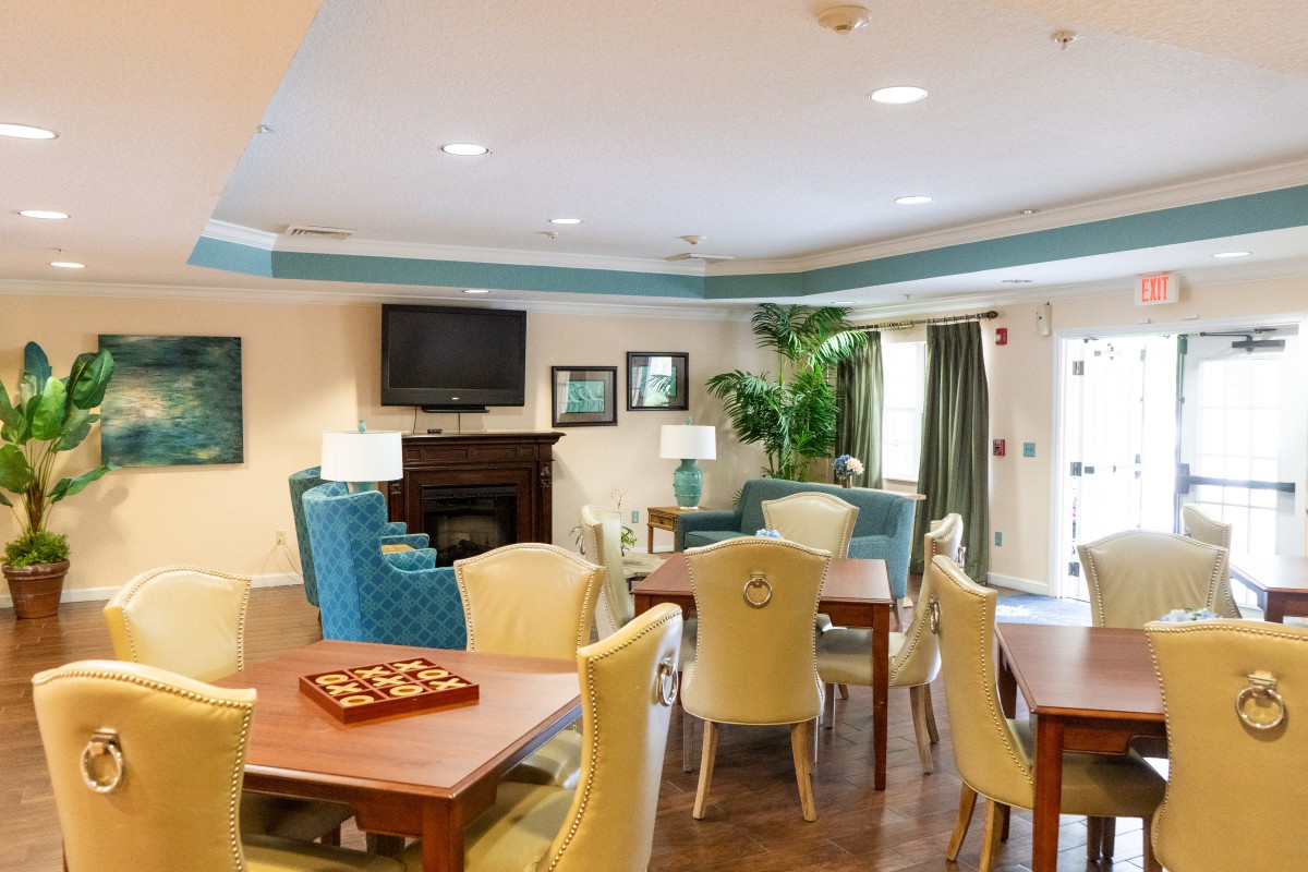 A cozy living room with comfortable seating and a television.