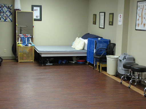 A cozy room featuring a bed and various storage items, ideal for relaxation or work.