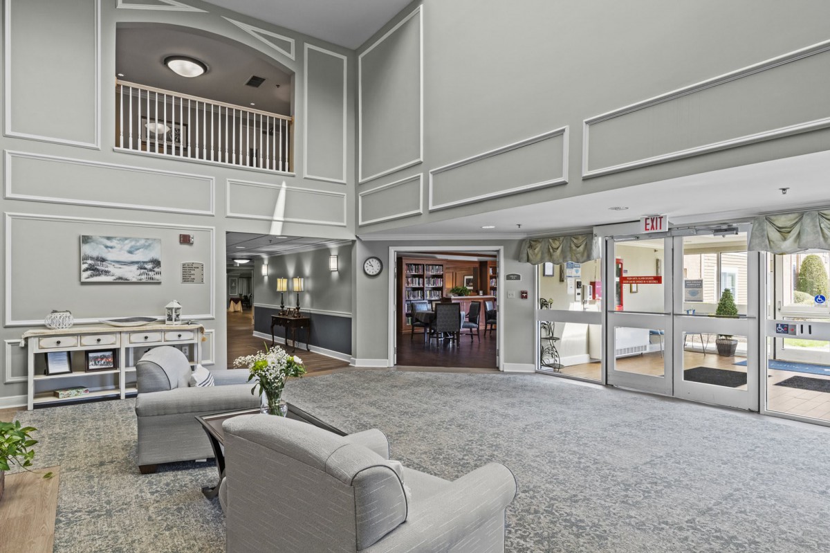 A modern and spacious lobby area with comfortable seating and elegant decor.