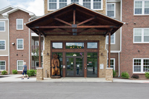 Main entrance to a residential building with wooden features.