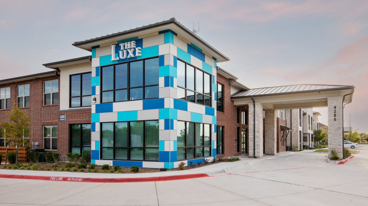 A modern commercial building with a colorful exterior.