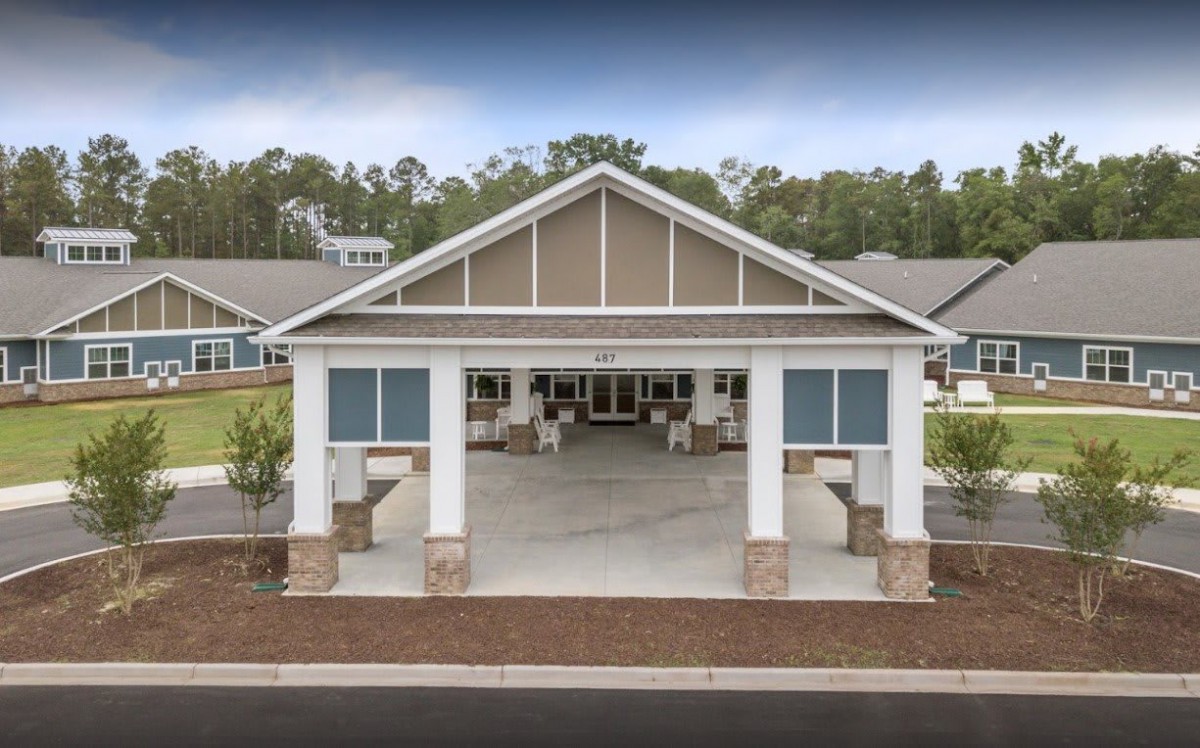 A front view of a large pavilion-style building entrance.