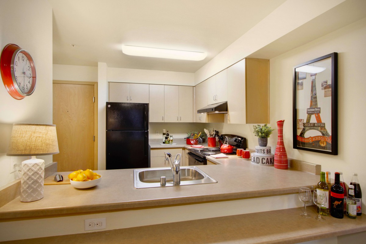 A modern kitchen with contemporary decor and appliances.