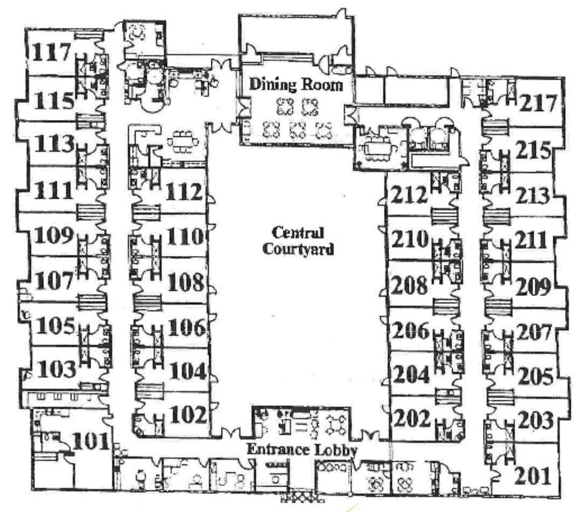 Floor plan of a building featuring a central courtyard and labeled rooms.