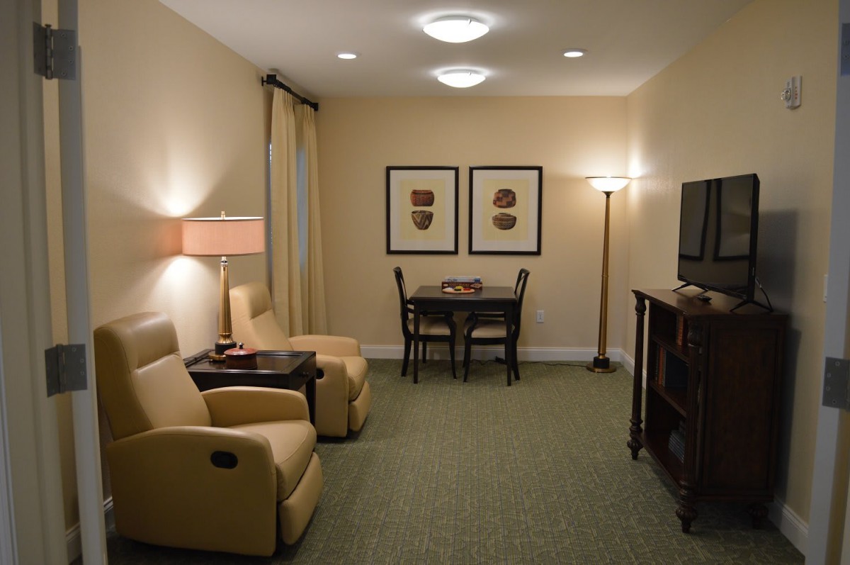 A cozy living room with comfortable seating and modern decor.