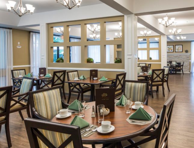 A well-arranged dining area with tables set for guests.