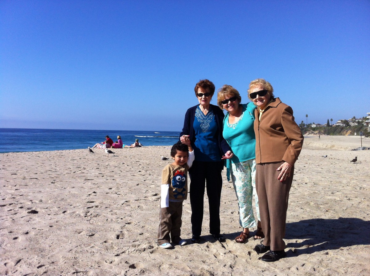 A family enjoying a sunny day at the beach.