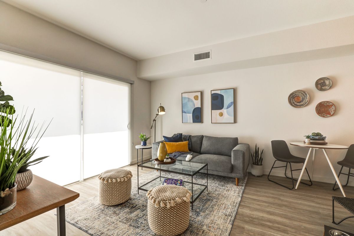 A modern living room with stylish furniture and decor.
