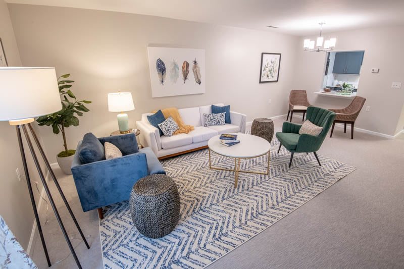 A modern living room with stylish furniture and decor.