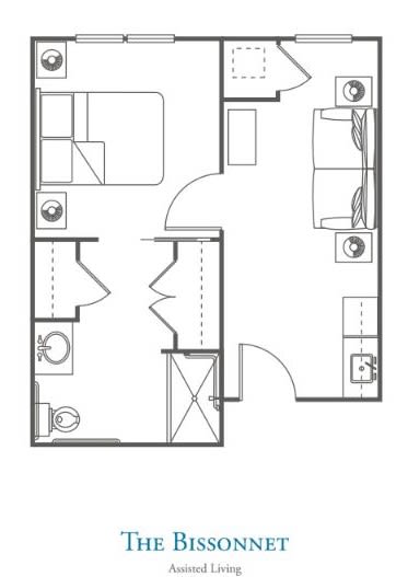 A simple floor plan depicting an apartment with two bedrooms, a kitchen, and two bathrooms.