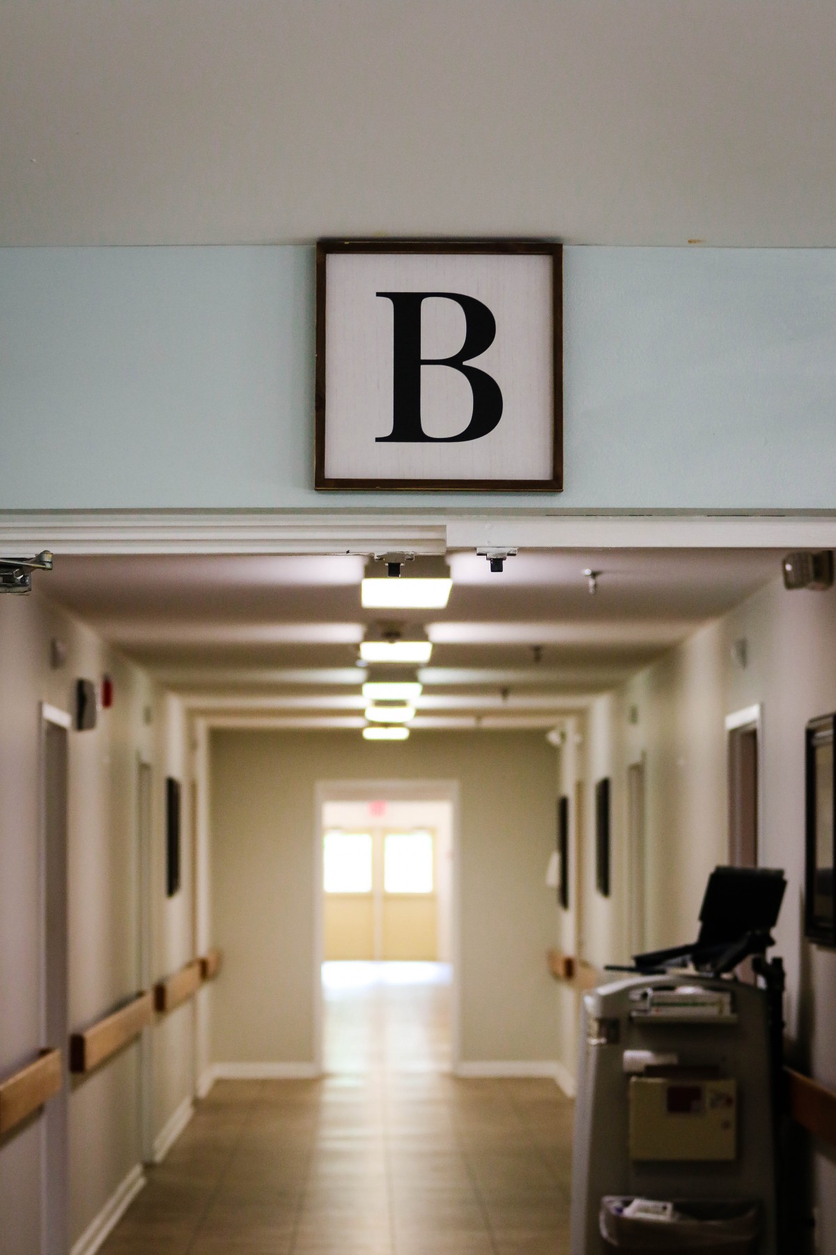 A hospital hallway marked with the letter 'B'.