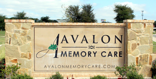 Entrance sign for Avalon Memory Care, a facility specializing in memory care services.