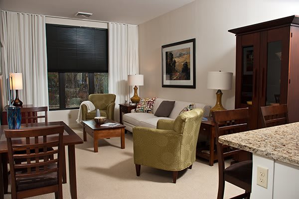 A cozy living room with comfortable seating and warm decor.