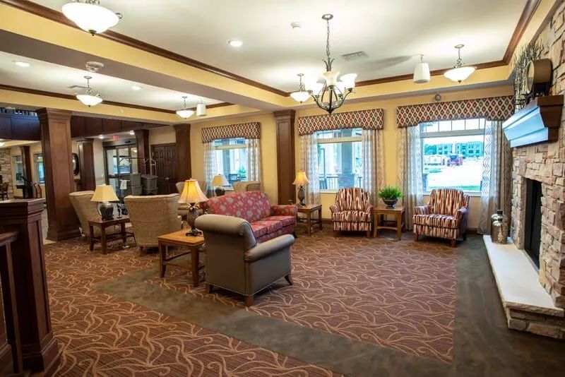 A cozy living area with comfortable seating and warm lighting.