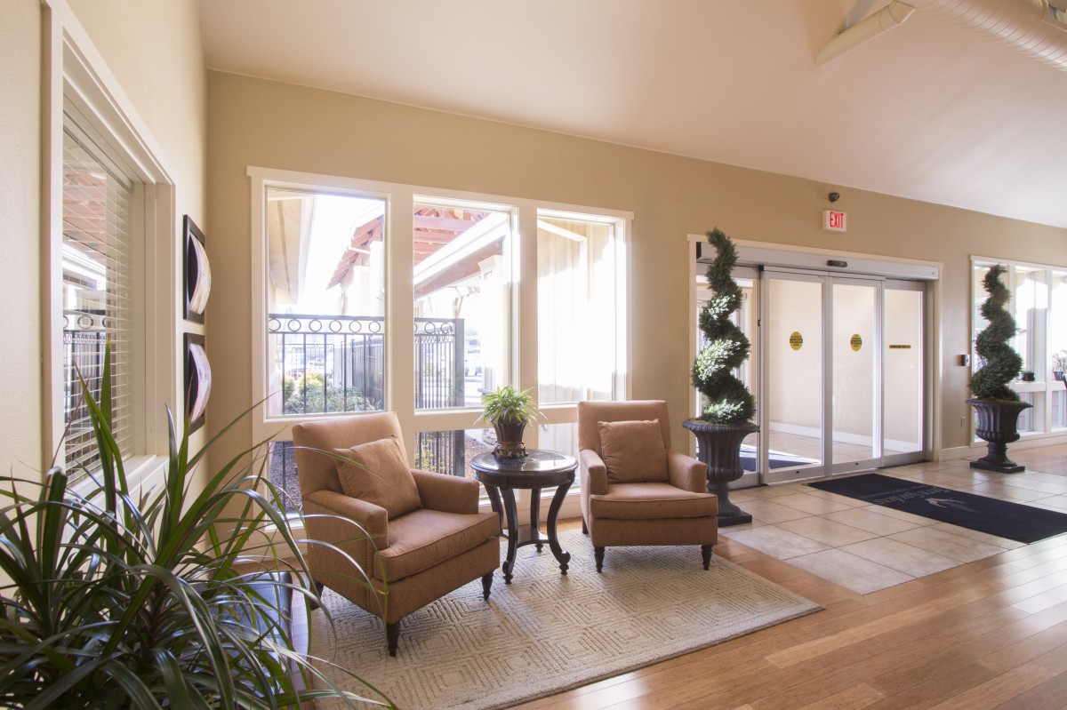 Bright and welcoming lobby area with comfortable seating and natural light.