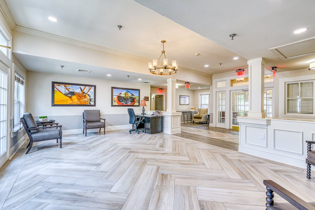 A modern and spacious lobby with elegant decor and comfortable seating.