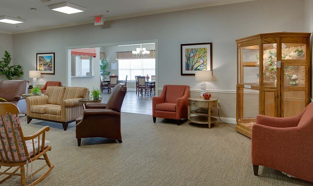 A cozy lobby area featuring comfortable armchairs and tasteful decor.