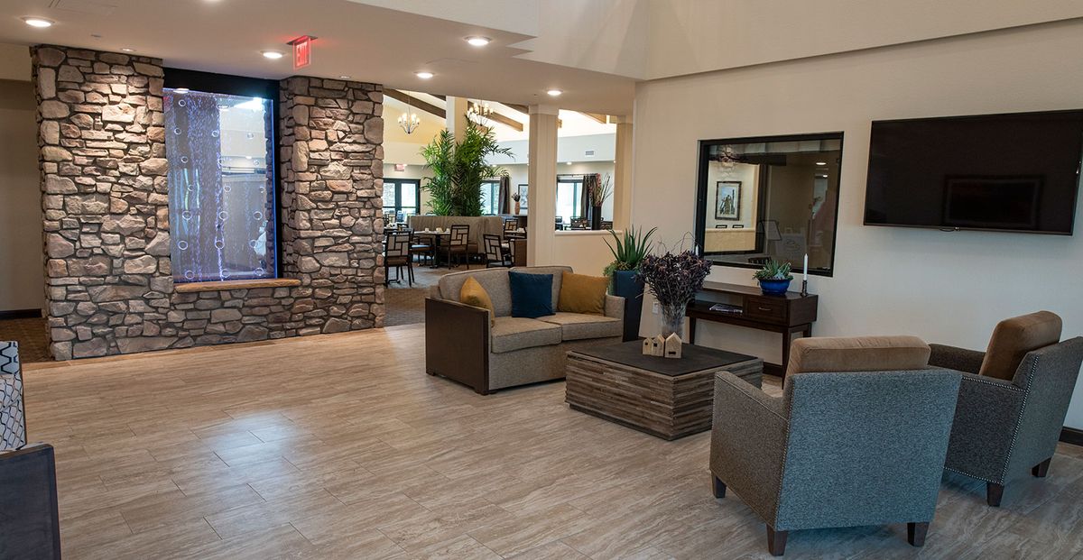 A modern lobby area featuring comfortable seating and stylish decor.