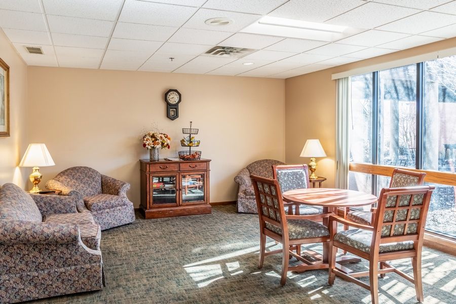 A cozy living room with comfortable seating and natural light.