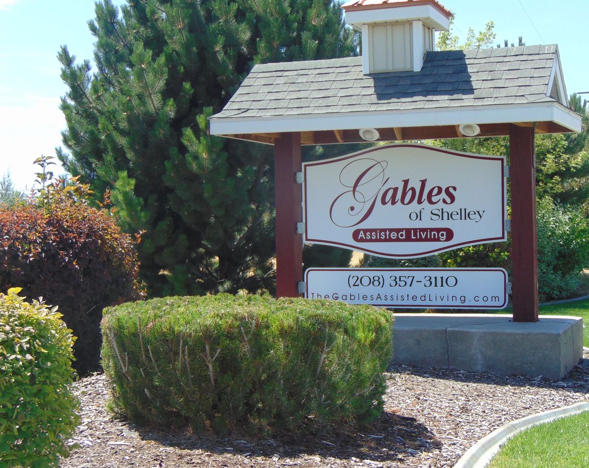 Entrance sign to Gables at Charlestowne neighborhood surrounded by landscaping.