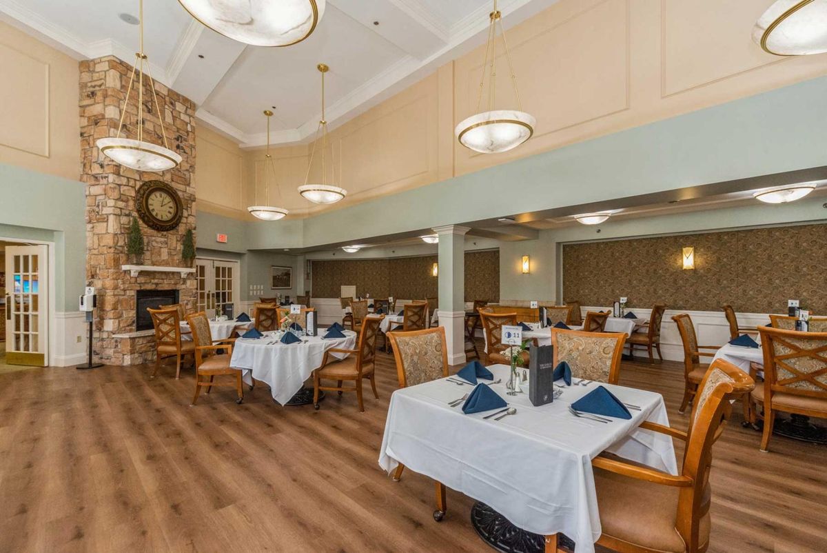 An elegant dining room with neatly arranged tables and tasteful decor.