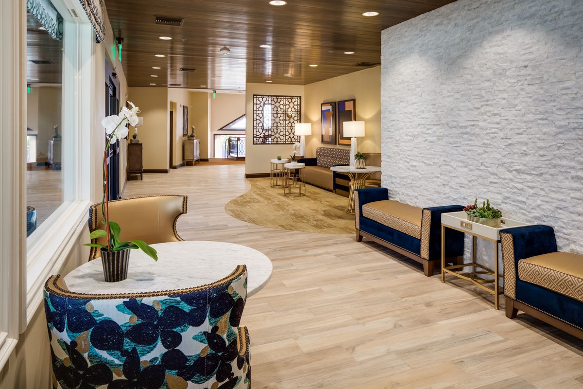 A modern lobby with comfortable seating and elegant decor.