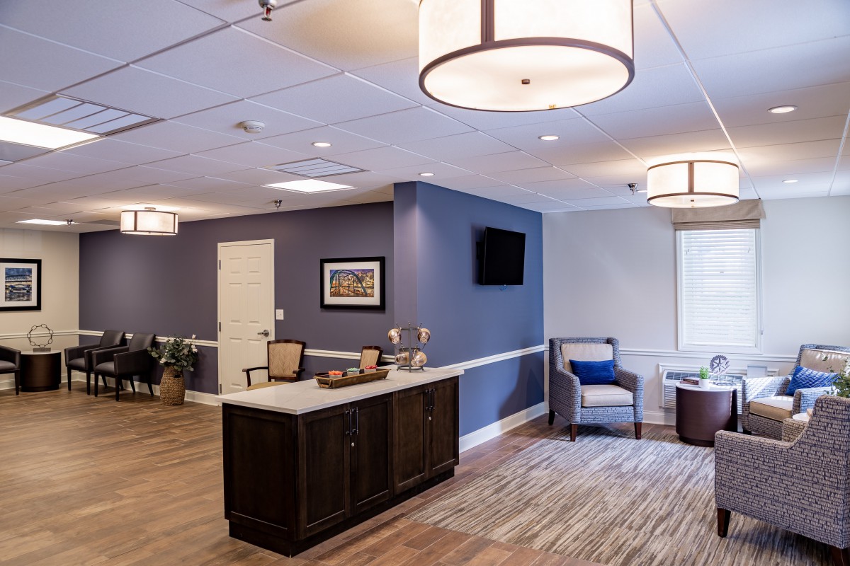 A modern lobby with comfortable seating and elegant lighting.