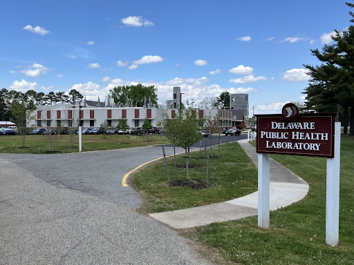 The Delaware Public Health Laboratory, showcasing its facility and surrounding landscape.