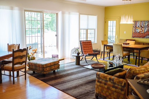 A bright and inviting living room with modern furnishings and a cozy atmosphere.