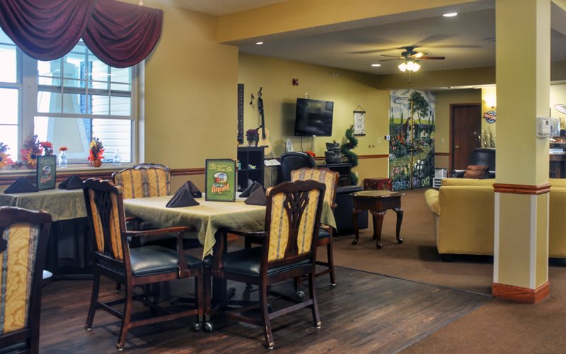 A cozy dining and living area with elegant decor.