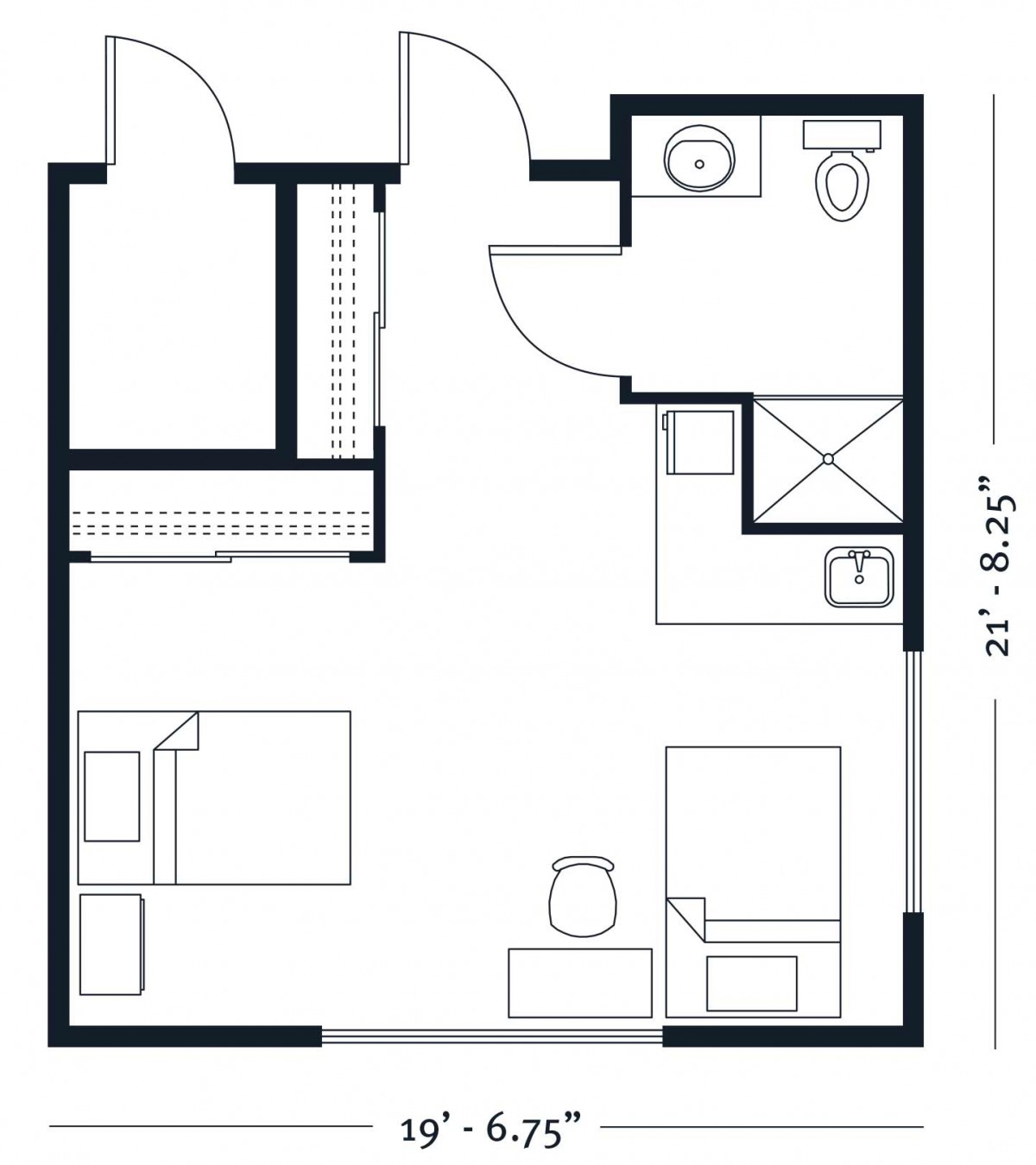 A compact one-bedroom apartment floor plan with a bathroom and kitchen area.