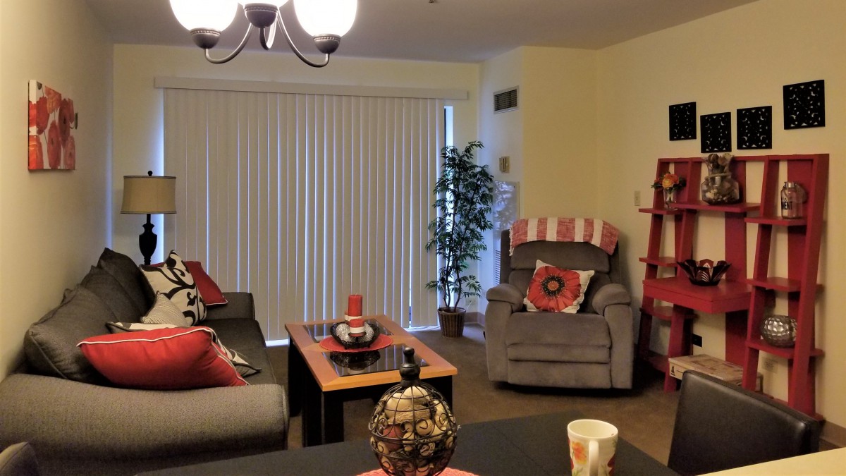 A cozy living room with stylish decorations and comfortable seating.