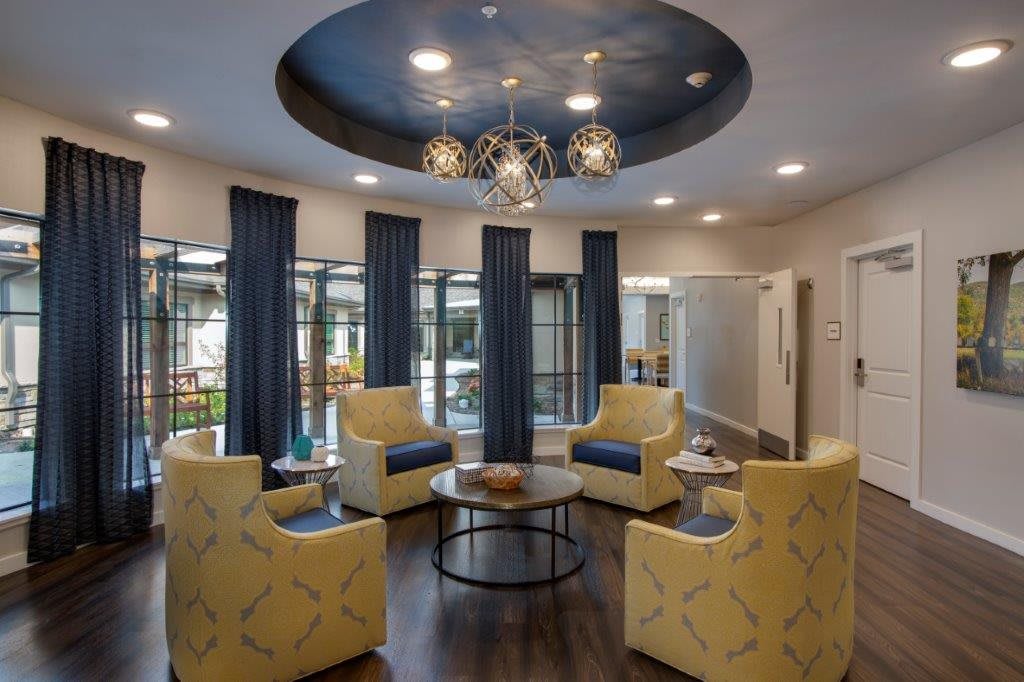 A modern lobby with stylish seating and elegant lighting.