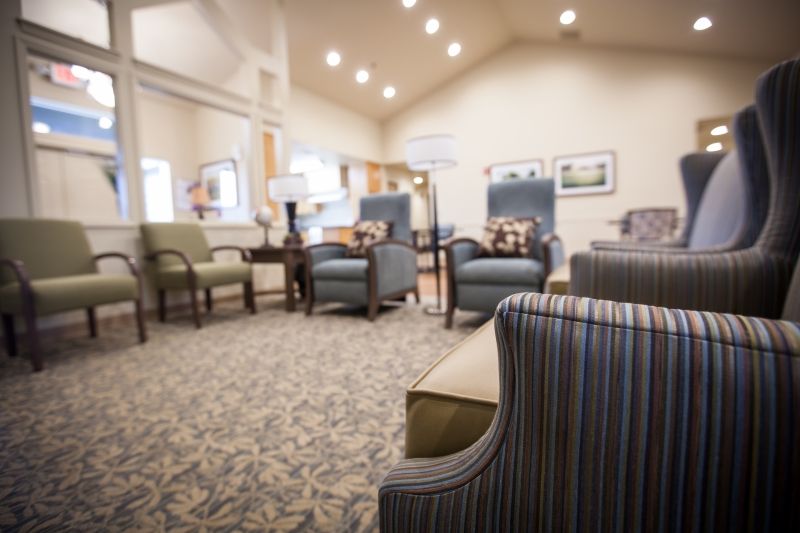 A cozy lobby area with comfortable seating and soft lighting.
