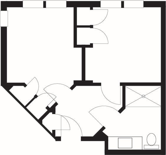 A simple architectural floor plan depicting a series of connected rooms with doors and a bathroom layout.