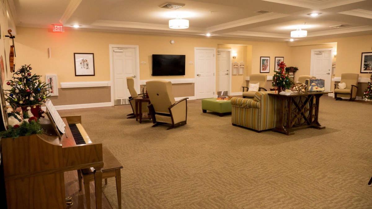 A cozy living room with comfortable seating and a TV.