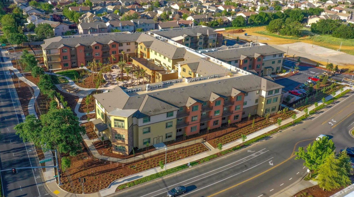 Aerial view of a residential apartment complex in an urban area.