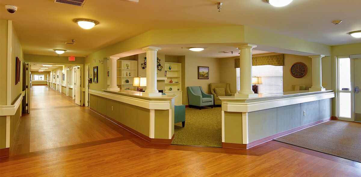 A cozy living area with comfortable seating and warm lighting.