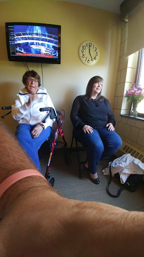 Two women enjoying a moment together indoors.