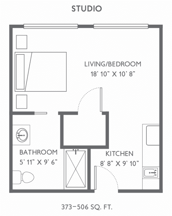 Studio apartment floor plan with living/bedroom, kitchen, and bathroom.