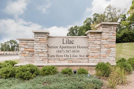 Entrance sign for Lilac Senior Apartment Homes.