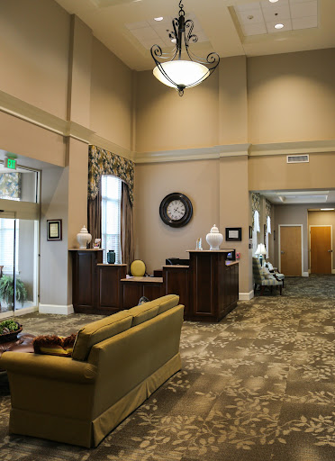 A welcoming lobby area featuring comfortable seating and a reception desk.